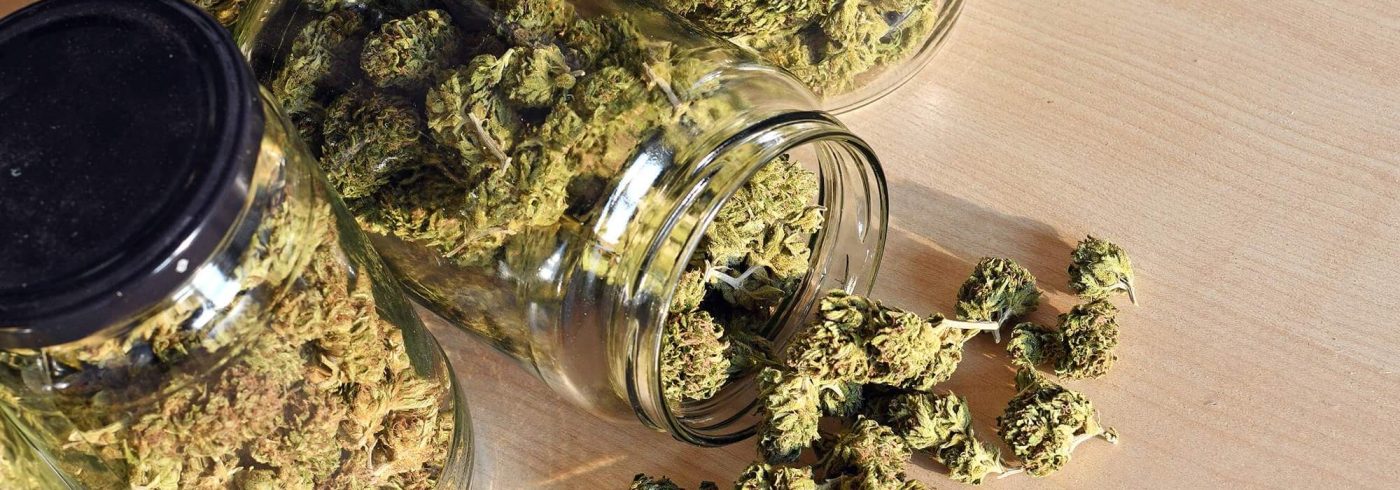 dry-and-trimmed-cannabis-buds-stored-in-a-glas-jar-PP4THVA-1-e1634563958624.jpg