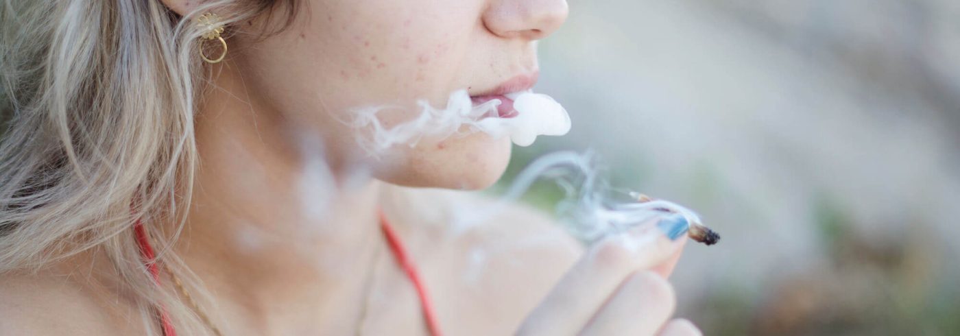 woman-smoking-a-cannabis-joint-WZUN2LG-1.jpg